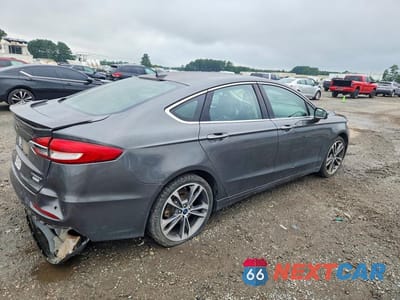 Trzecie zdjęcie samochodu z tyłu: 2019 FORD FUSION TITANIUM VIN:3FA6P0K91KR269439 - miniatura