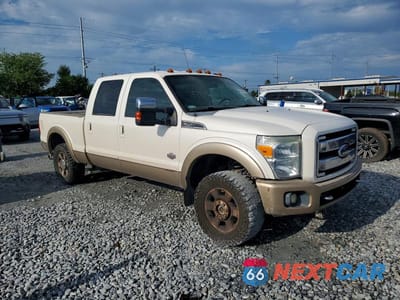 Czwarte zdjęcie samochodu z boku: 2012 FORD F250 SUPER DUTY VIN:1FT7W2BT4CEA10909 - miniatura