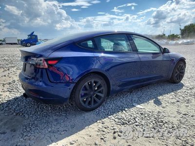 Trzecie zdjęcie samochodu z tyłu: 2022 TESLA MODEL 3 VIN:5YJ3E1EAXNF191828 - miniatura