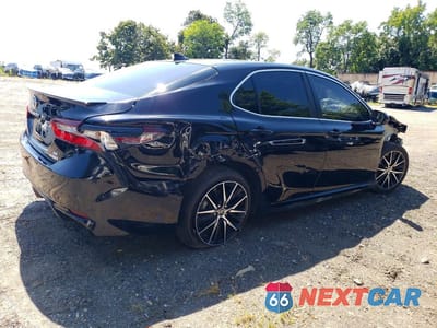 Trzecie zdjęcie samochodu z tyłu: 2023 TOYOTA CAMRY HYBRID SE VIN:4T1S31AK0PU053043 - miniatura