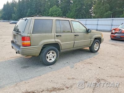 Trzecie zdjęcie samochodu z tyłu: 1998 JEEP GRAND CHEROKEE LAREDO VIN:1J4FX48S3WC236243 - miniatura