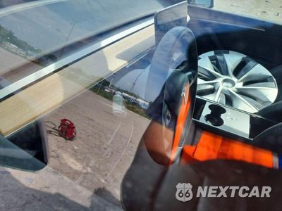 Zdjęcie 8 z 12 samochodu: 2023 TESLA MODEL Y VIN:7SAYGDEE7PA054532 - miniatura