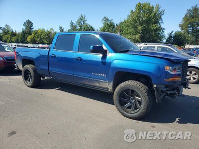 Czwarte zdjęcie samochodu z boku: 2017 CHEVROLET SILVERADO K1500 LT VIN:3GCUKREC8HG200036 - miniatura