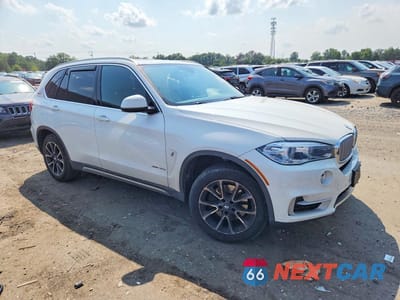Czwarte zdjęcie samochodu z boku: 2018 BMW X5 XDR40E VIN:5UXKT0C56J0W01100 - miniatura