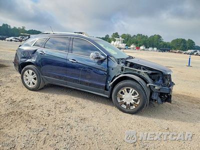 Czwarte zdjęcie samochodu z boku: 2014 CADILLAC SRX LUXURY COLLECTION VIN:3GYFNBE39ES681330 - miniatura