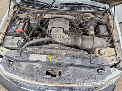 Zdjęcie 11 z 12 samochodu: 2003 FORD F150 VIN:2FTRX17W63CB06646 - miniatura