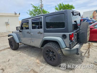 Drugie zdjęcie samochodu z przodu: 2017 JEEP WRANGLER UNLIMITED SPORT VIN:1C4BJWDG2HL556255 - miniatura