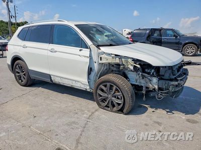 Czwarte zdjęcie samochodu z boku: 2024 VOLKSWAGEN TIGUAN SE VIN:3VVNB7AX7RM192422 - miniatura