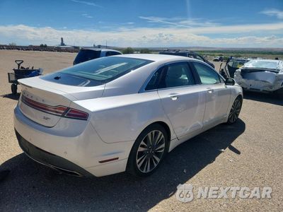 Trzecie zdjęcie samochodu z tyłu: 2017 LINCOLN MKZ SELECT VIN:3LN6L5C9XHR603294 - miniatura