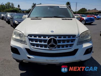Piąte zdjęcie samochodu w środku: 2009 MERCEDES-BENZ ML 350 VIN:4JGBB86E39A530700 - miniatura