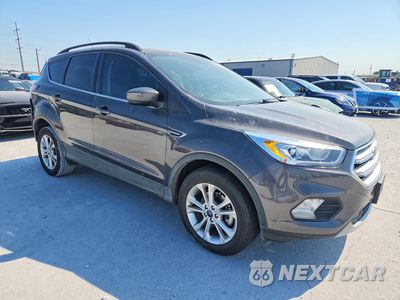 Czwarte zdjęcie samochodu z boku: 2018 FORD ESCAPE SEL VIN:1FMCU0HD6JUD36685 - miniatura