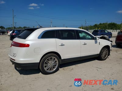 Trzecie zdjęcie samochodu z tyłu: 2016 LINCOLN MKT VIN:2LMHJ5AT8GBL00514 - miniatura