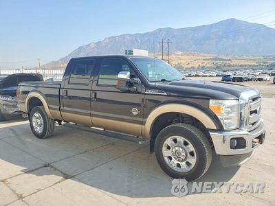 Czwarte zdjęcie samochodu z boku: 2014 FORD F350 SUPER DUTY VIN:1FT8W3BT0EEA50420 - miniatura