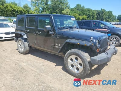 Czwarte zdjęcie samochodu z boku: 2009 JEEP WRANGLER UNLIMITED X VIN:1J4GA391X9L705922 - miniatura