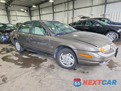Czwarte zdjęcie samochodu z boku: 2001 SATURN SL VIN:1G8ZF52891Z272642 - miniatura