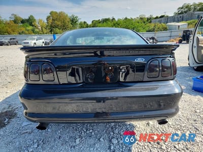 Zdjęcie 6 z 12 samochodu: 1994 FORD MUSTANG COBRA VIN:1FALP42D7RF213432 - miniatura