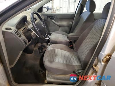 Zdjęcie 7 z 12 samochodu: 2005 FORD FOCUS ZX4 VIN:1FAFP34N45W295207 - miniatura