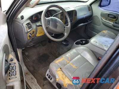 Zdjęcie 8 z 12 samochodu: 2001 FORD F150 SUPERCREW VIN:1FTRW07L71KC60939 - miniatura