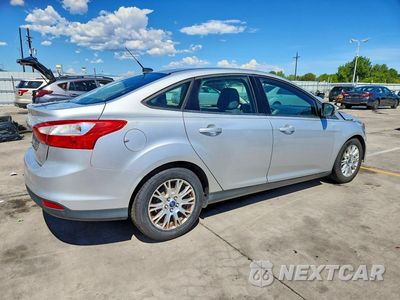 Trzecie zdjęcie samochodu z tyłu: 2012 FORD FOCUS SE VIN:1FAHP3F21CL424675 - miniatura