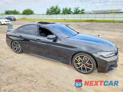 Czwarte zdjęcie samochodu z boku: 2022 BMW 540 XI VIN:WBA73BJ00NWX74184 - miniatura
