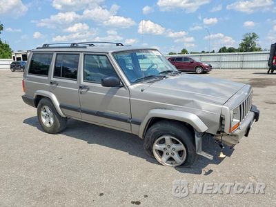 Czwarte zdjęcie samochodu z boku: 2001 JEEP CHEROKEE SPORT VIN:1J4FF48S61L512264 - miniatura