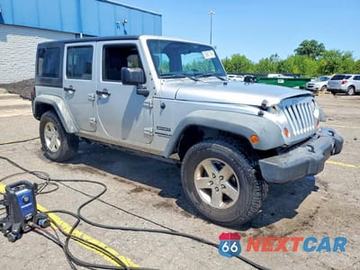 Czwarte zdjęcie samochodu z boku: 2011 JEEP WRANGLER UNLIMITED SPORT VIN:1J4BA3H18BL604282 - miniatura