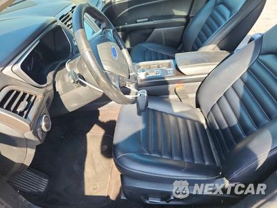 Zdjęcie 7 z 12 samochodu: 2019 FORD FUSION SEL VIN:3FA6P0MU8KR110984 - miniatura