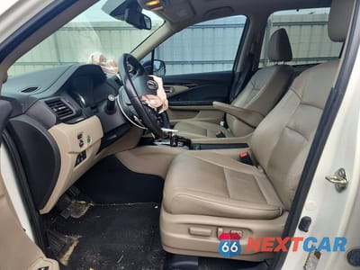 Zdjęcie 7 z 14 samochodu: 2016 HONDA PILOT TOURING VIN:5FNYF5H95GB041186 - miniatura
