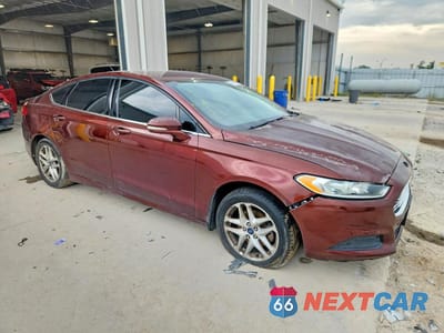 Czwarte zdjęcie samochodu z boku: 2016 FORD FUSION SE VIN:3FA6P0H75GR172581 - miniatura