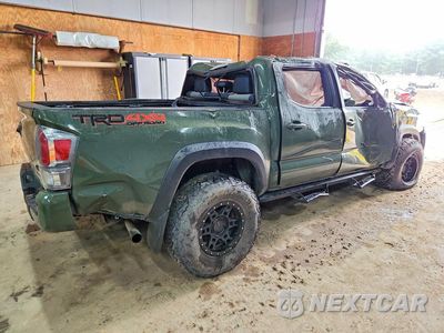 Trzecie zdjęcie samochodu z tyłu: 2022 TOYOTA TACOMA TRD OFF-ROAD VIN:3TMCZ5AN1NM472836 - miniatura