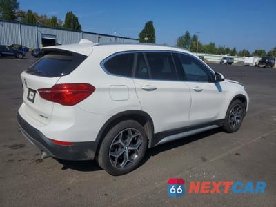 Trzecie zdjęcie samochodu z tyłu: 2019 BMW X1 XDRIVE28I VIN:WBXHT3C54K5L89219 - miniatura