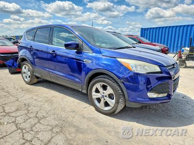 Czwarte zdjęcie samochodu z boku: 2014 FORD ESCAPE SE VIN:1FMCU0GX9EUD25990 - miniatura
