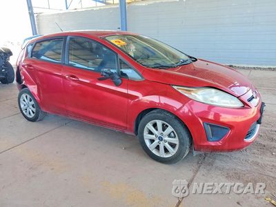 Czwarte zdjęcie samochodu z boku: 2012 FORD FIESTA SE VIN:3FADP4EJ6CM154080 - miniatura