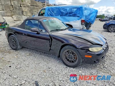 Czwarte zdjęcie samochodu z boku: 2004 MAZDA MX-5 MIATA BASE VIN:JM1NB353040401039 - miniatura