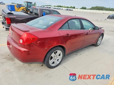 Trzecie zdjęcie samochodu z tyłu: 2009 PONTIAC G6 VIN:1G2ZG57B594100533 - miniatura