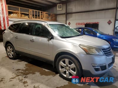 Czwarte zdjęcie samochodu z boku: 2016 CHEVROLET TRAVERSE LT VIN:1GNKVGKD3GJ184963 - miniatura