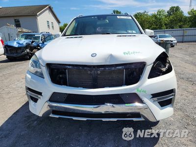 Piąte zdjęcie samochodu w środku: 2015 MERCEDES-BENZ ML 400 4MATIC VIN:4JGDA5GB4FA515570 - miniatura