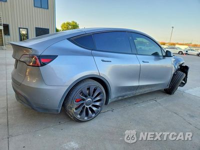 Trzecie zdjęcie samochodu z tyłu: 2024 TESLA MODEL Y VIN:7SAYGDEFXRA319102 - miniatura