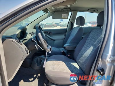 Zdjęcie 7 z 12 samochodu: 2005 FORD FOCUS ZX4 VIN:1FAFP34N35W304415 - miniatura