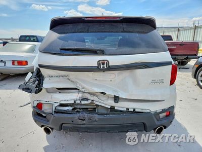 Zdjęcie 6 z 13 samochodu: 2022 HONDA PASSPORT ELITE VIN:5FNYF8H05NB018362 - miniatura
