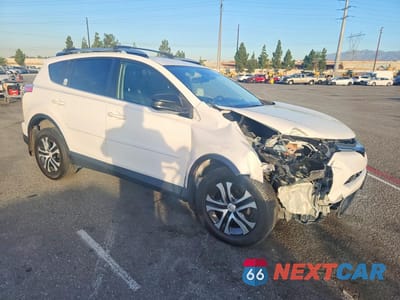 Czwarte zdjęcie samochodu z boku: 2018 TOYOTA RAV4 LE VIN:JTMZFREVXJJ750936 - miniatura