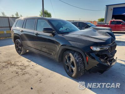 Czwarte zdjęcie samochodu z boku: 2023 JEEP GRAND CHEROKEE L LAREDO VIN:1C4RJKAG4P8771536 - miniatura