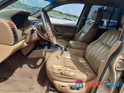 Zdjęcie 7 z 13 samochodu: 1999 JEEP GRAND CHEROKEE LIMITED VIN:1J4GW68NXXC696921 - miniatura