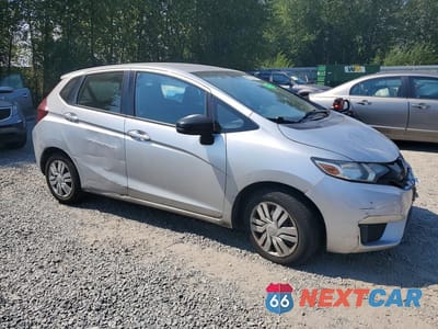 Czwarte zdjęcie samochodu z boku: 2016 HONDA FIT LX VIN:JHMGK5H56GX027547 - miniatura