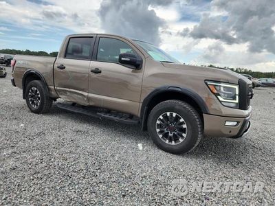 Czwarte zdjęcie samochodu z boku: 2023 NISSAN TITAN PRO-4X VIN:1N6AA1ED6PN106109 - miniatura