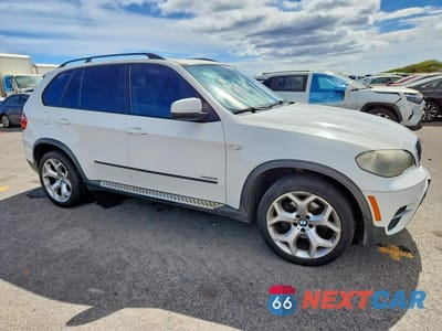 Czwarte zdjęcie samochodu z boku: 2011 BMW X5 XDRIVE35I VIN:5UXZV4C51BL402407 - miniatura