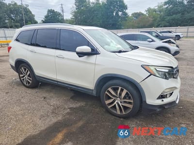 Czwarte zdjęcie samochodu z boku: 2016 HONDA PILOT TOURING VIN:5FNYF5H95GB041186 - miniatura