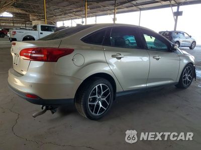 Trzecie zdjęcie samochodu z tyłu: 2018 FORD FOCUS SEL VIN:1FADP3H21JL270865 - miniatura