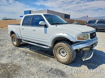 Czwarte zdjęcie samochodu z boku: 2002 FORD F150 SUPERCREW VIN:1FTRW08L62KA27764 - miniatura