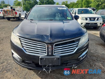 Piąte zdjęcie samochodu w środku: 2016 LINCOLN MKC RESERVE VIN:5LMTJ3DHXGUJ10884 - miniatura